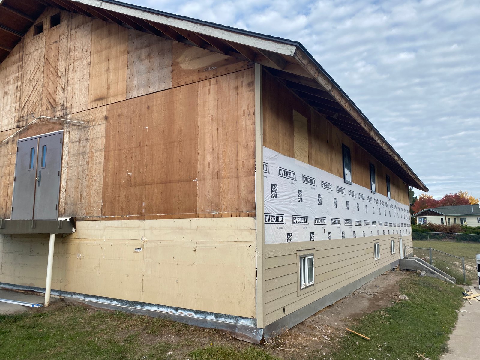 Before photo of damaged siding needing repair in Kalispell